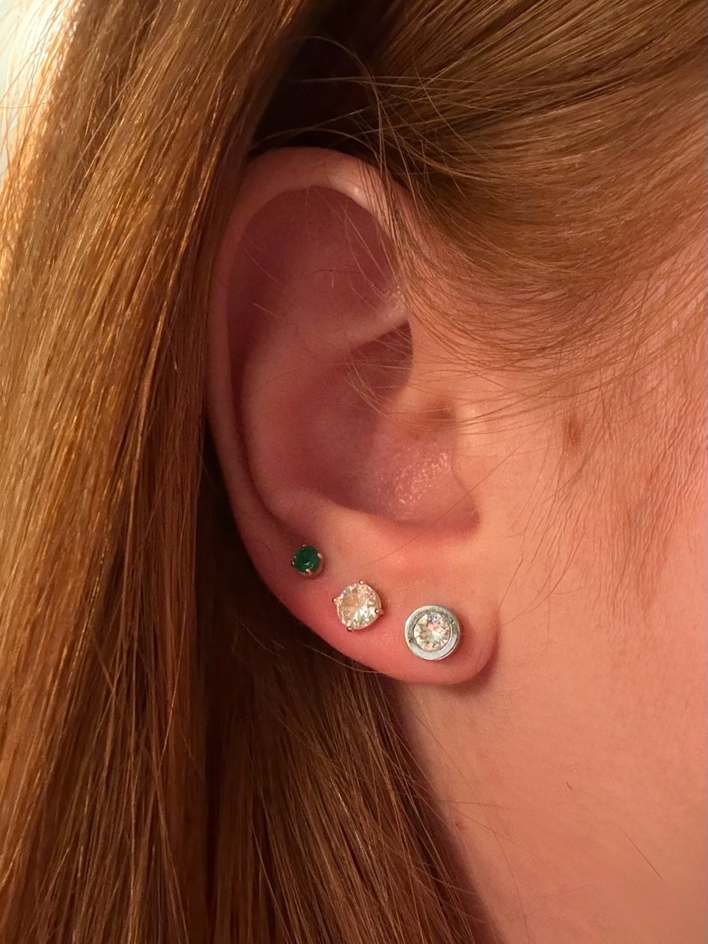 Swatch silver earring (first of set)